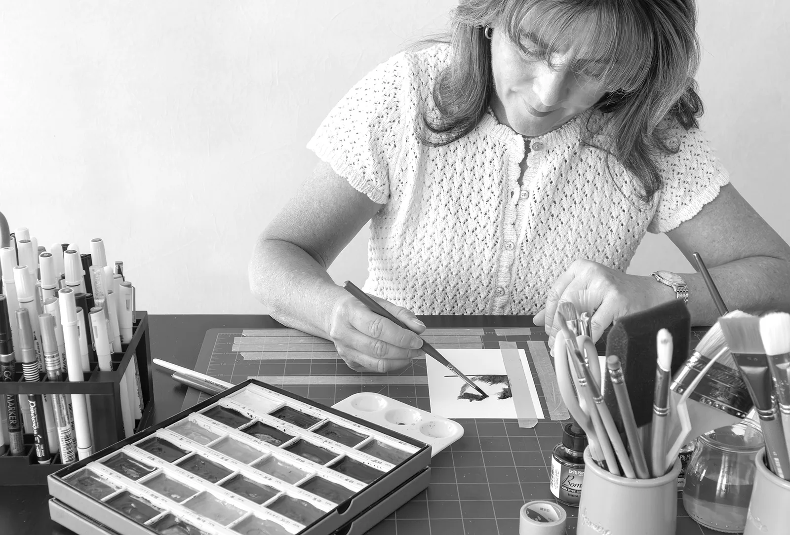 Patty Nash painting in her studio